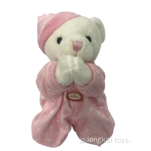 赤ちゃんのためのピンクの祈りクマ